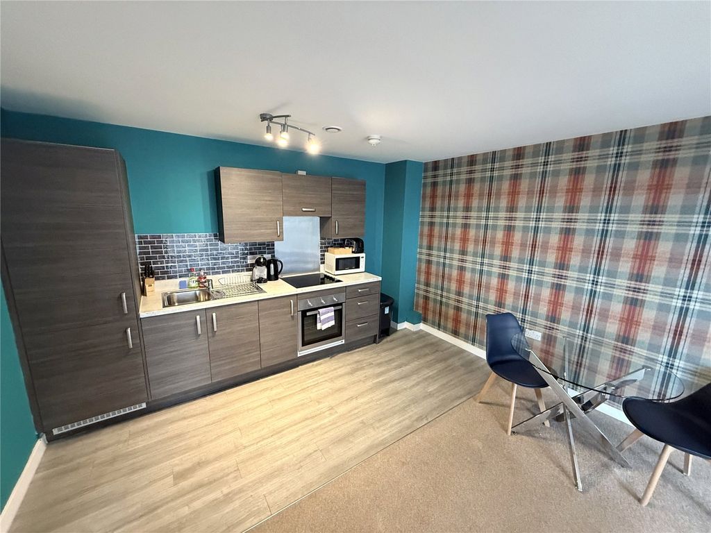 Property photo 2 of 6 Kitchen