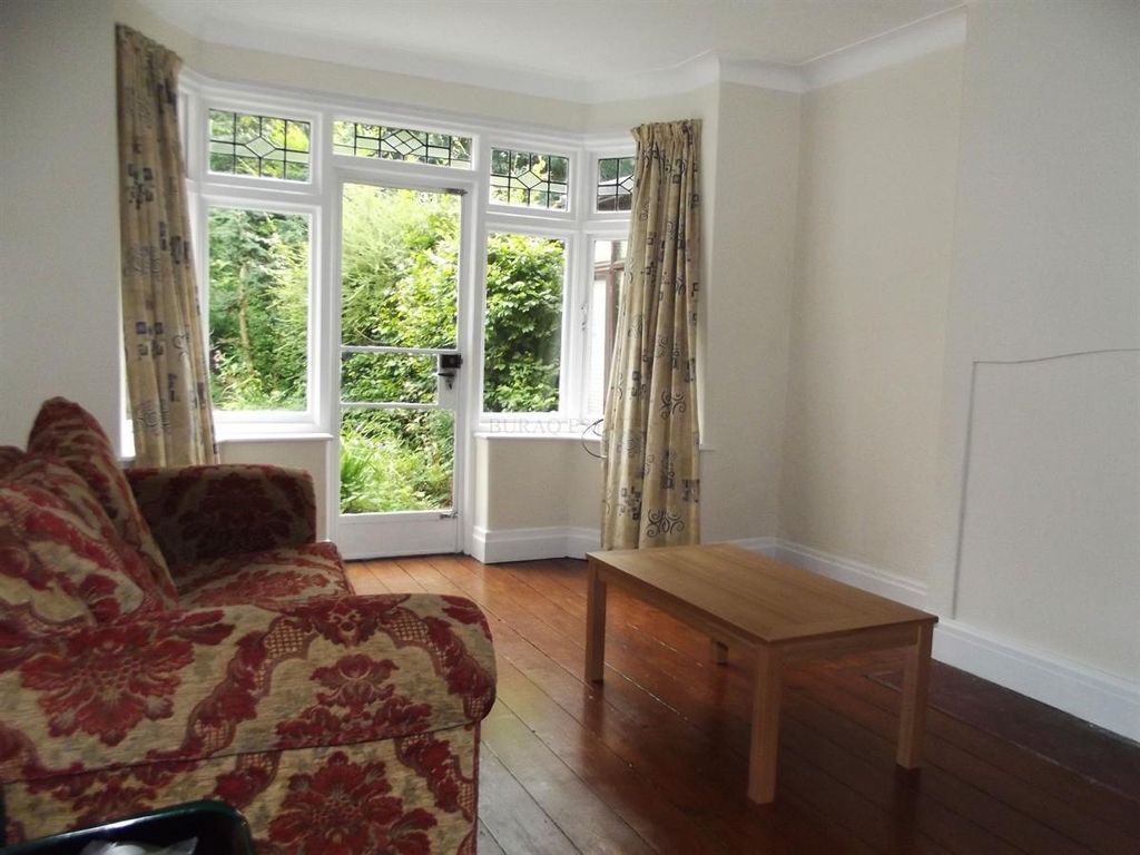 Property photo 1 of 13 Bright Living Room With A Large Bay Window And Gar...