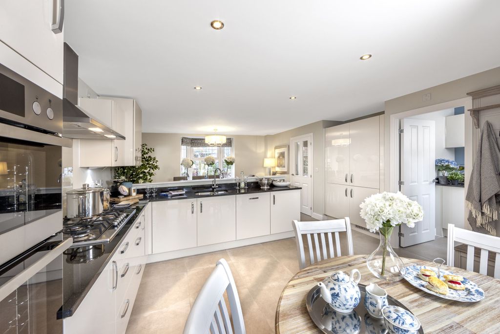 Property photo 3 of 9 Kitchen Area