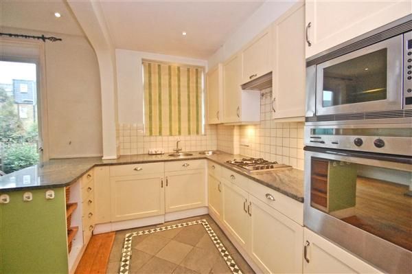 Property photo 2 of 9 Kitchen