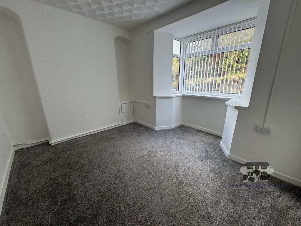 Property photo 2 of 12 Front Lounge