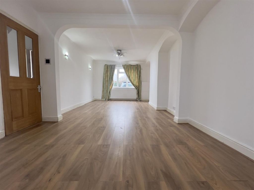 Property photo 2 of 13 Living Area