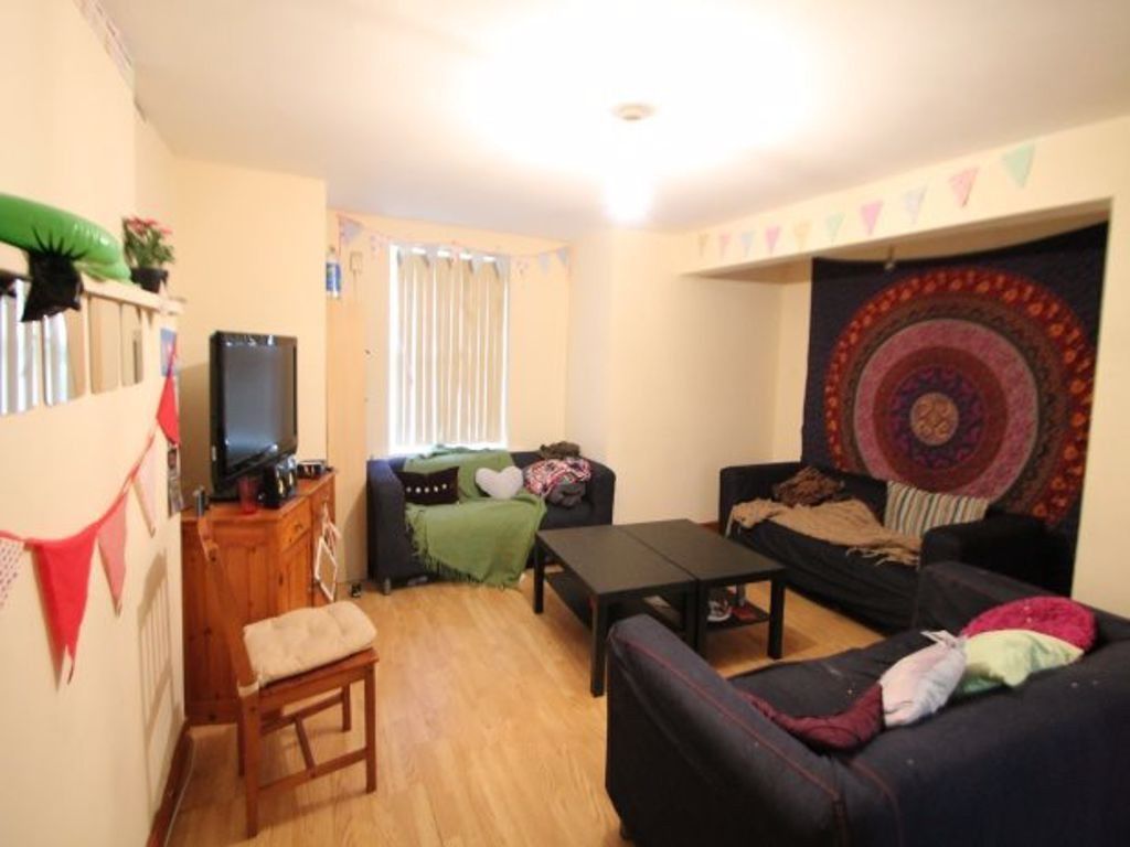 Property photo 2 of 16 A Cozy And Inviting Living Room Featuring Comforta...