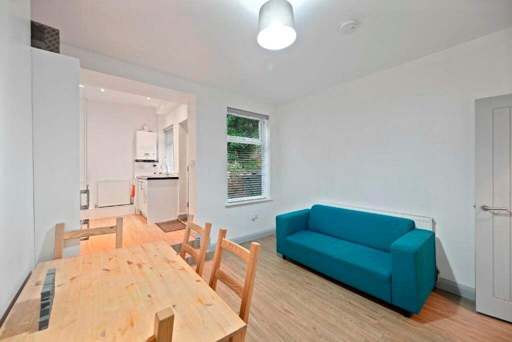 Property photo 2 of 15 A Bright And Tidy Living Room Featuring A Modern T...