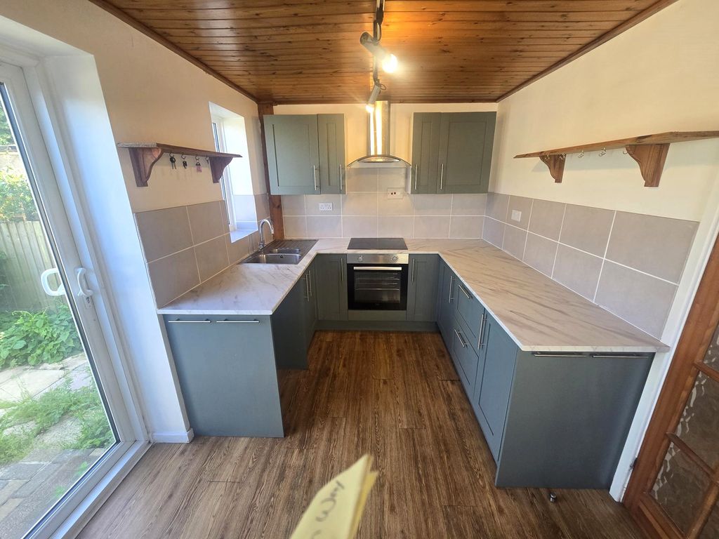 Property photo 2 of 13 Kitchen