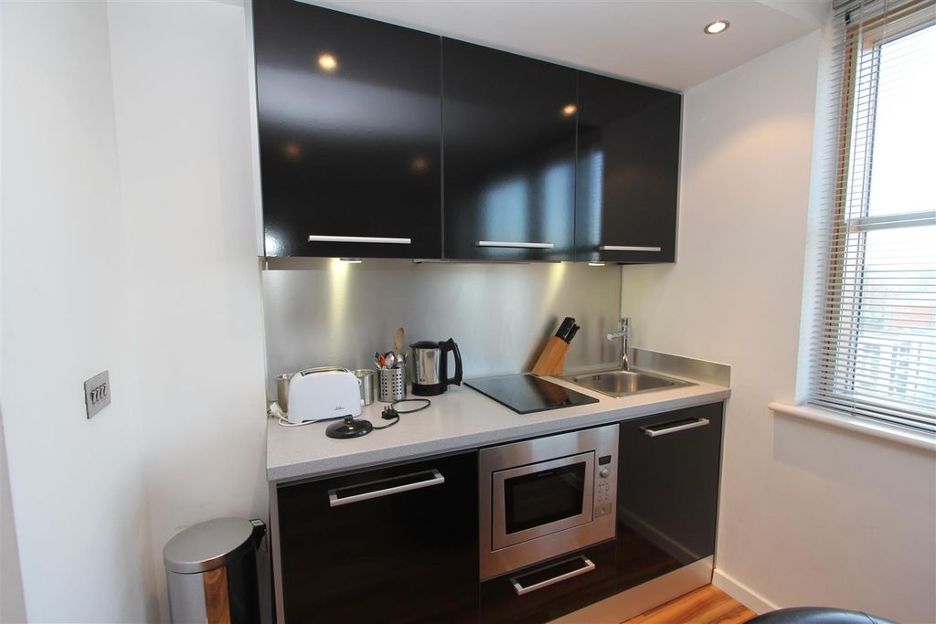 Property photo 3 of 6 Modern Sleek Kitchen With High-Gloss Cabinets...