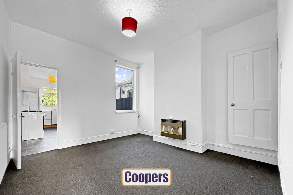 Property photo 1 of 9 Rear Living Room