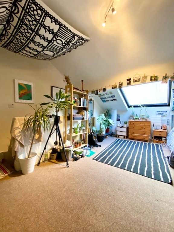 Property photo 1 of 9 Bright And Airy Master Bedroom Featuring A Sloped ...