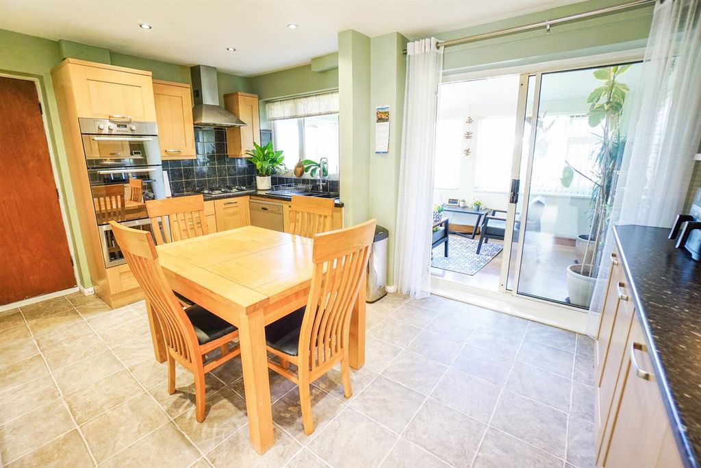 Property photo 2 of 17 Dining Kitchen