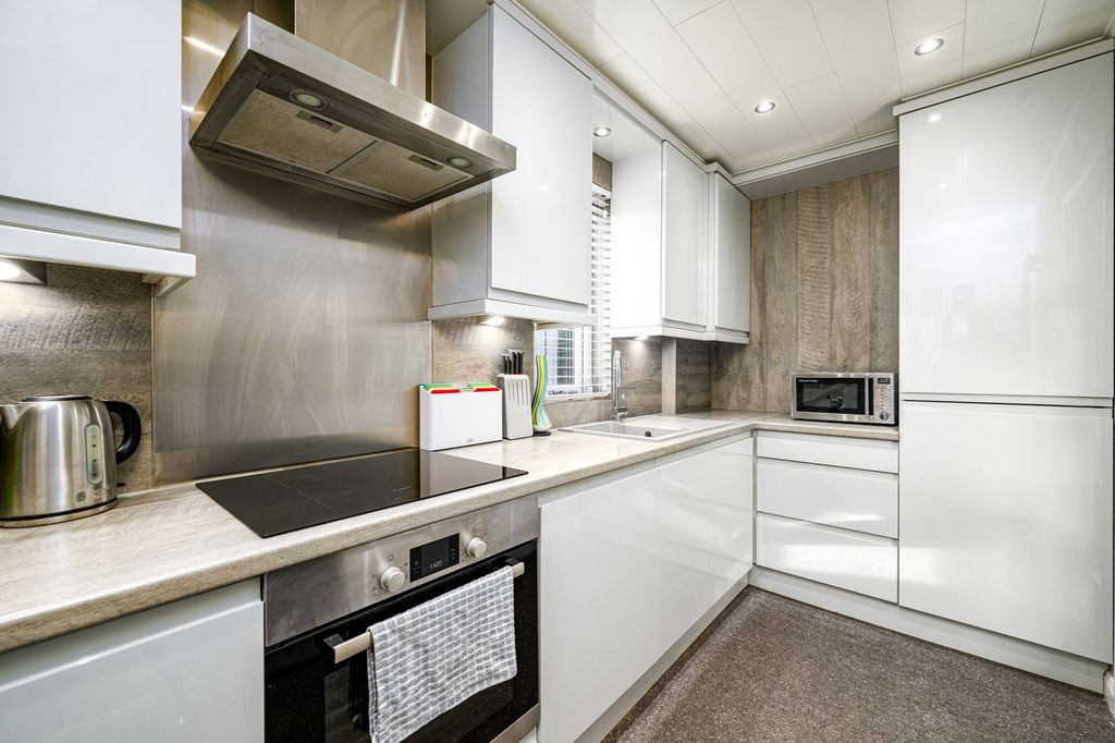 Property photo 3 of 16 Kitchen