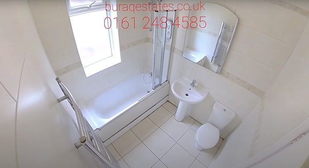 Property photo 3 of 13 Bright, Modern Bathroom With A Fitted Bath And Ove...