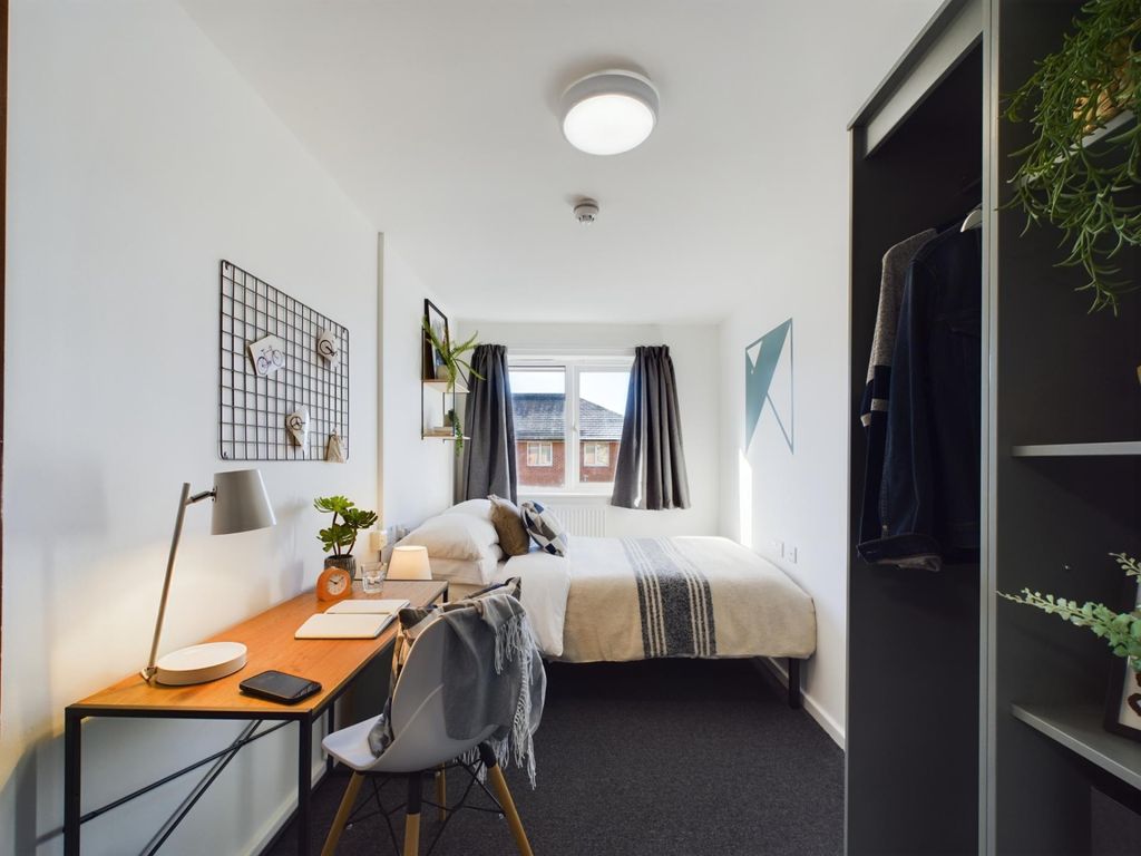 Property photo 2 of 11 Bright And Welcoming Master Bedroom Featuring A Co...