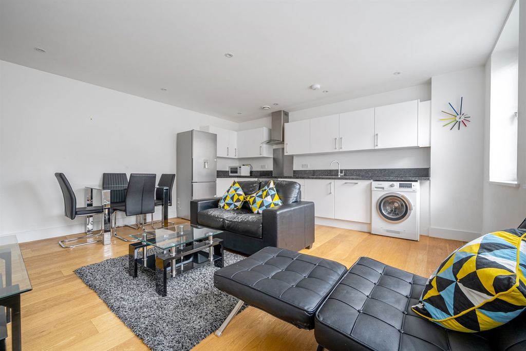 Property photo 2 of 9 Living Area