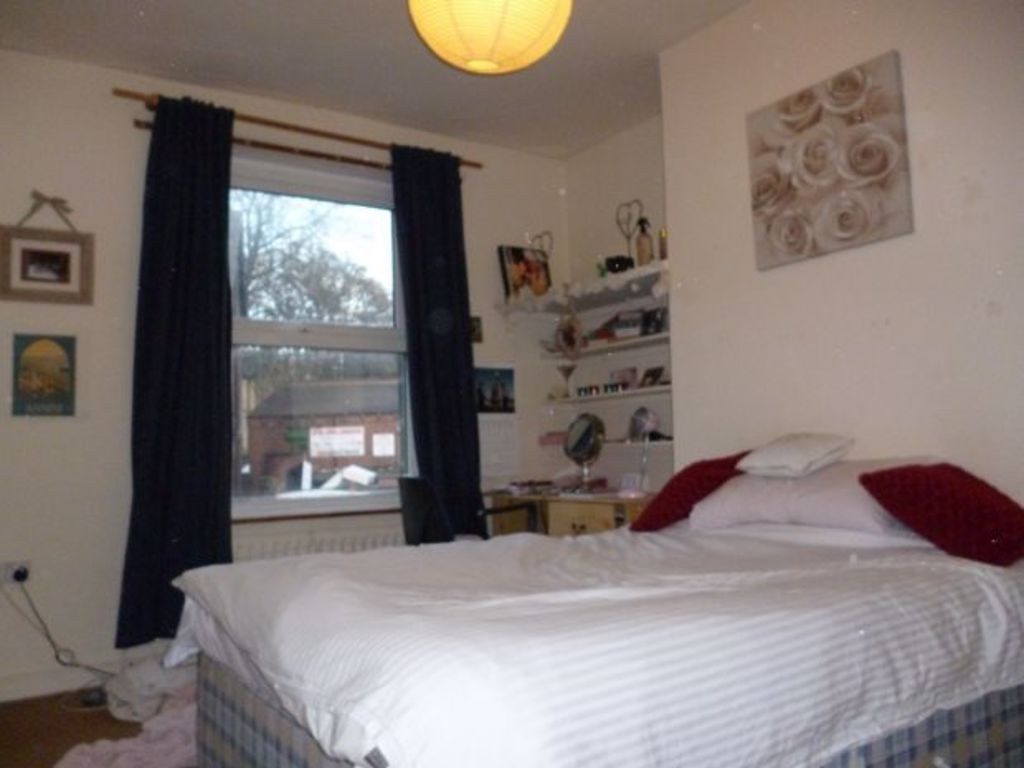 Property photo 3 of 24 A Spacious Master Bedroom Featuring A Large Bed, W...