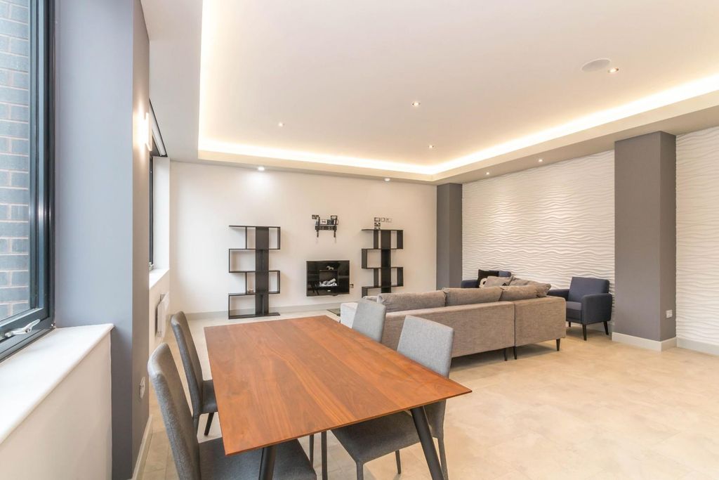Property photo 3 of 17 Living Area
