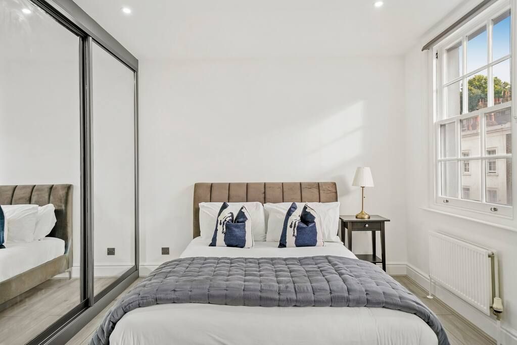 Property photo 1 of 8 Large Bedroom, With A Comfortable Double Bed And Wardrobe. Perfect For A Restful Night Sleep.