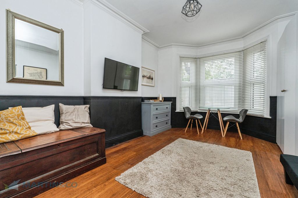 Property photo 1 of 12 4. Living Room