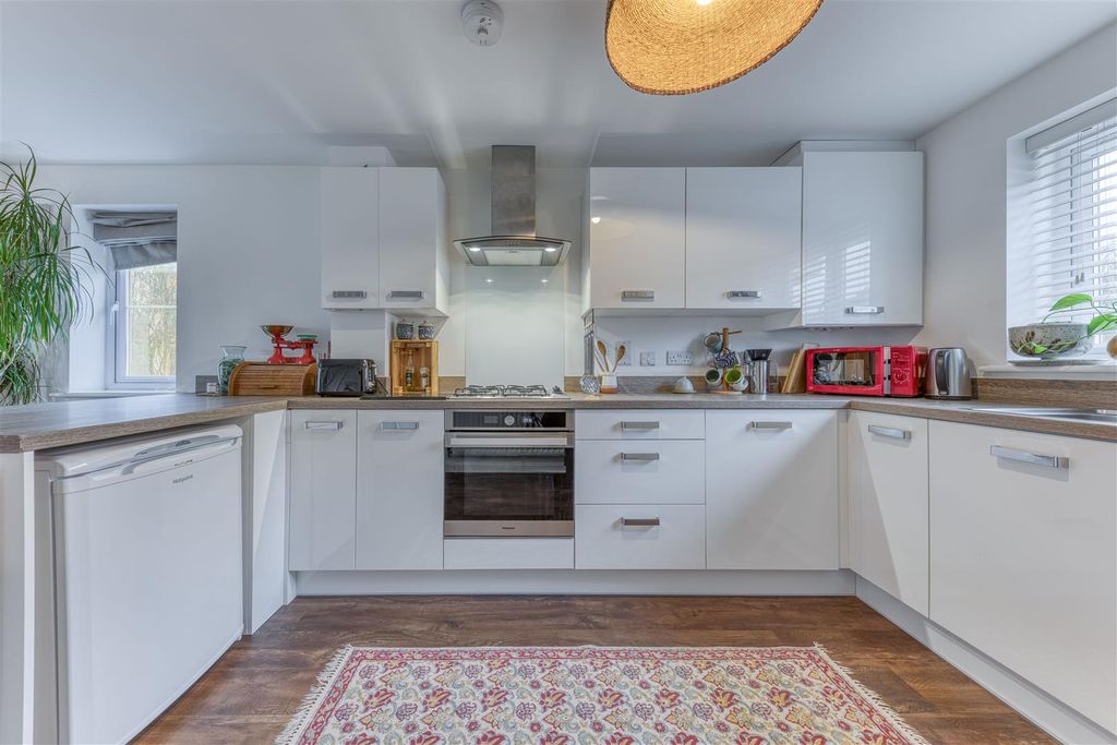 Property photo 2 of 11 Kitchen Area