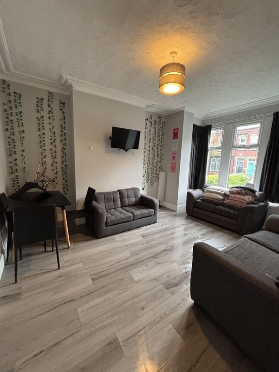 Property photo 3 of 19 Bright And Welcoming Living Room With Comfortable ...