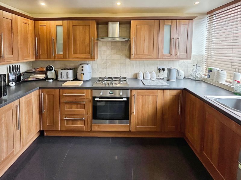 Property photo 3 of 12 Kitchen