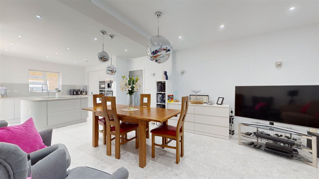 Property photo 3 of 32 Kitchen/Dining/Family Room