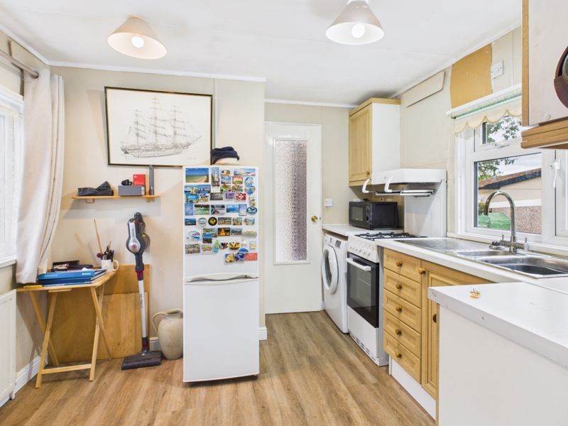 Property photo 3 of 8 Kitchen