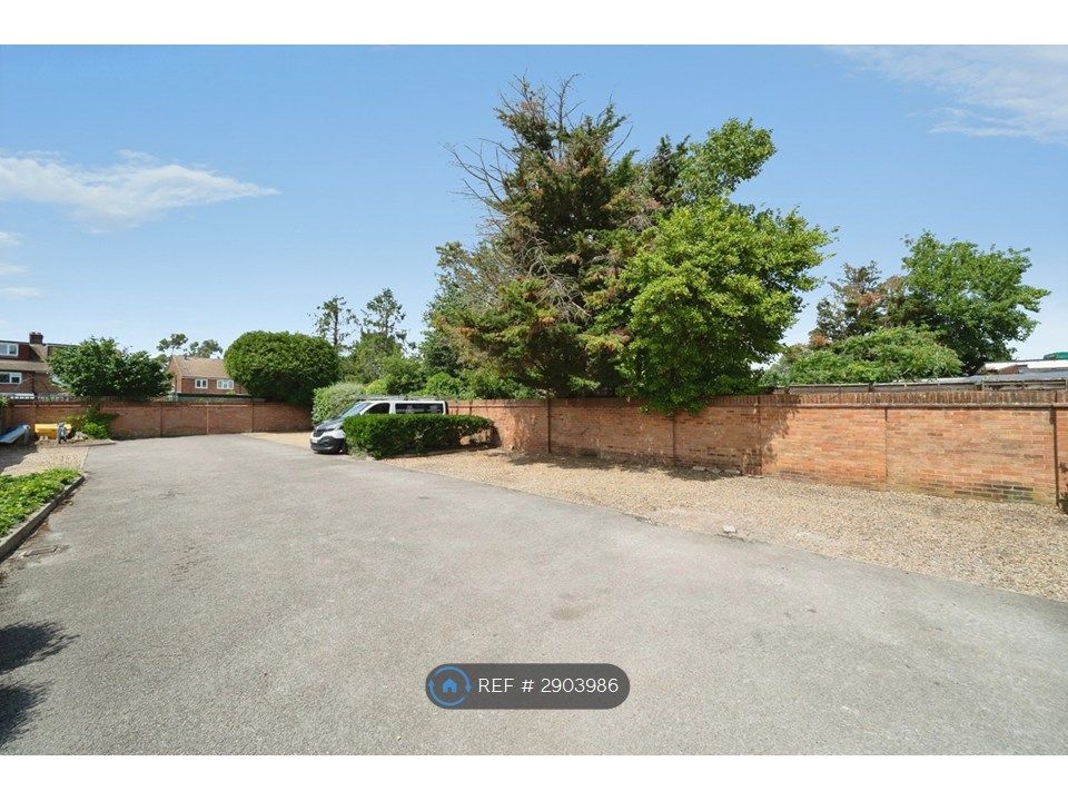 Property photo 2 of 11 Outside Rear - Parking