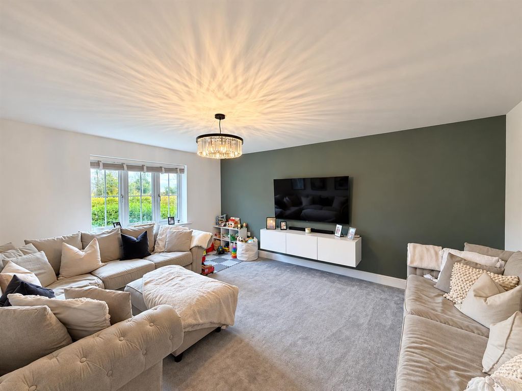 Property photo 3 of 21 Contemporary Olive-Green Family Living Room.Png