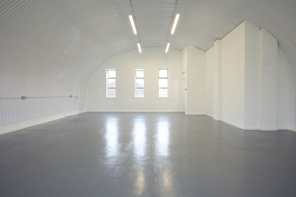 Property photo 2 of 3 The Mezzanine Level Of An Arch With White Lining.