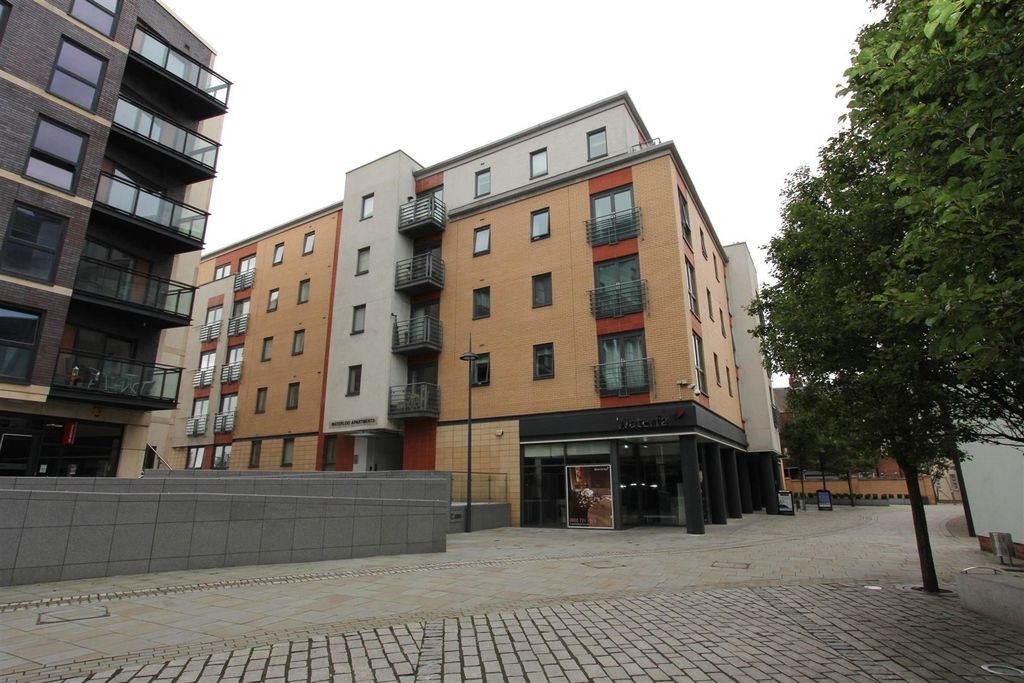 Property photo 1 of 5 Modern Apartment Building With A Sleek Exterior...