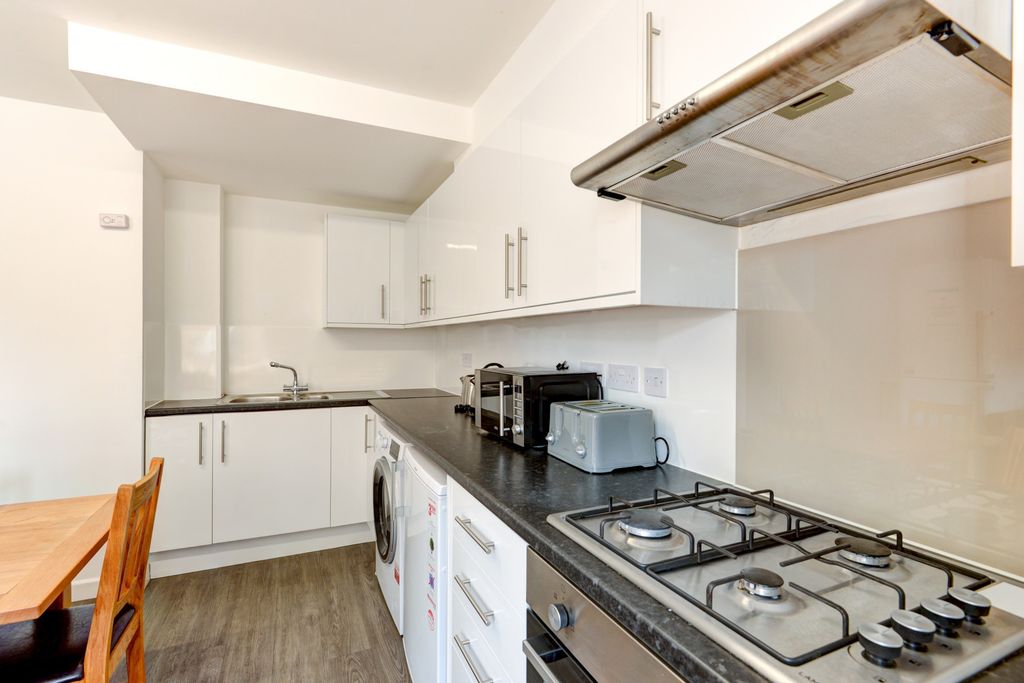 Property photo 3 of 10 Bright And Modern Kitchen With Clean White Cabinet...