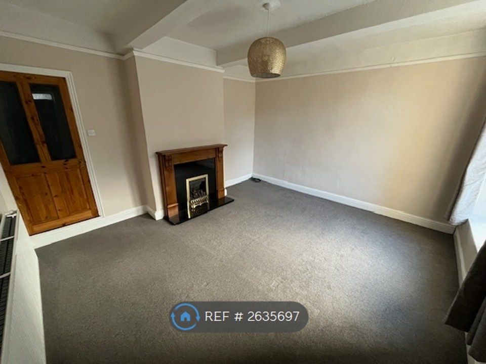 Property photo 2 of 10 Spacious Lounge With Coal-Effect Gas Fire.