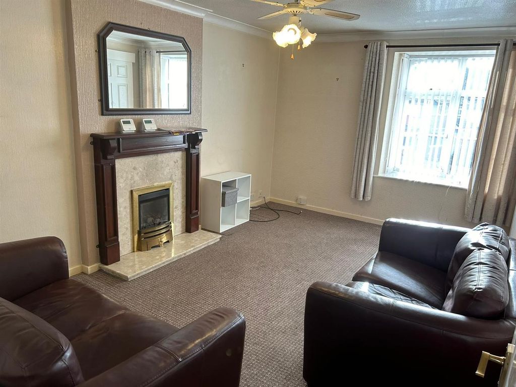 Property photo 2 of 10 Living Room: