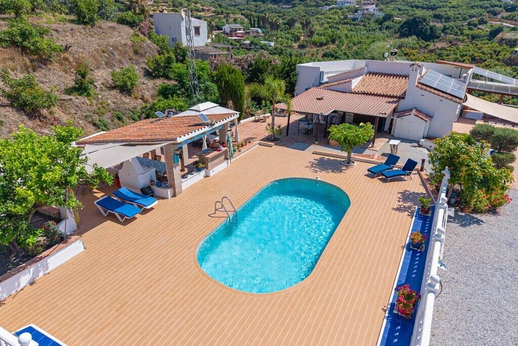 Property photo 3 of 10 Pool And House