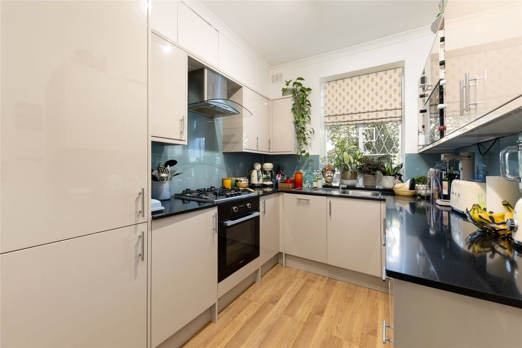 Property photo 3 of 12 Kitchen
