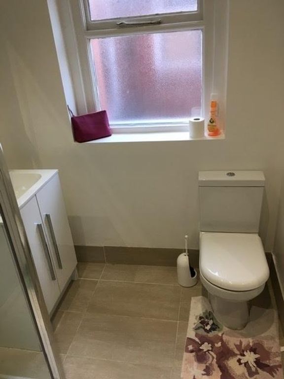 Property photo 2 of 9 A Modern Bathroom Featuring A Sleek Shower, Contem...