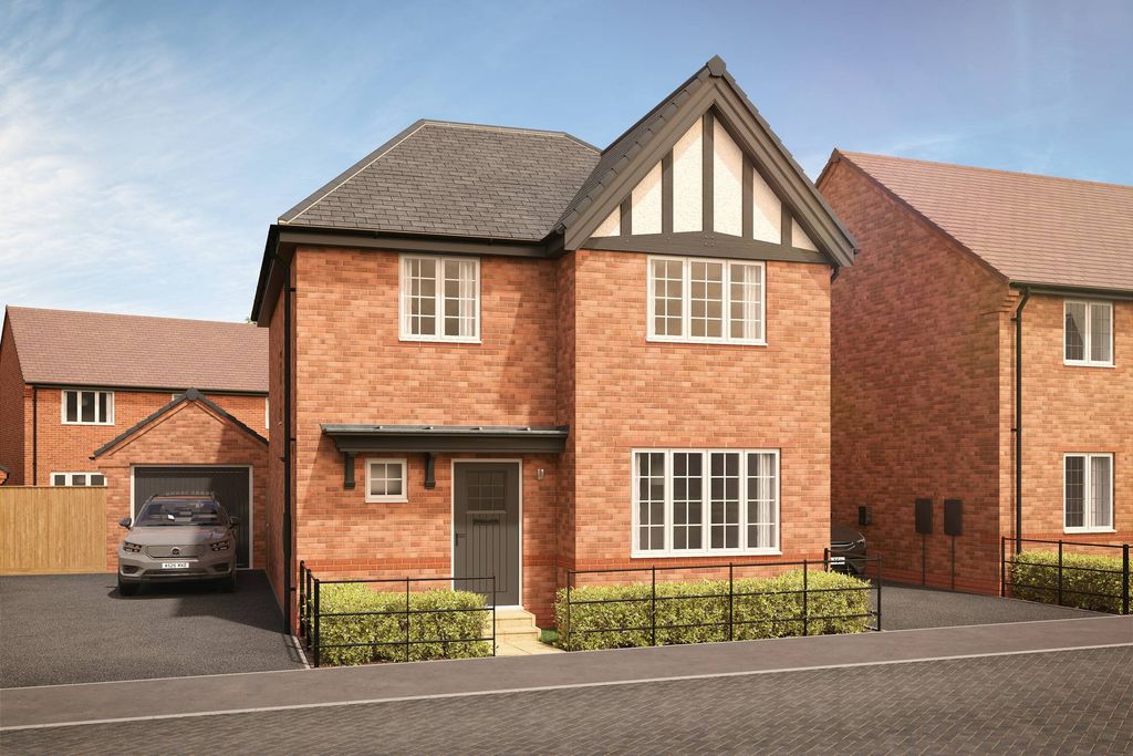 Property photo 1 of 10 A Red Brick House With A Dark Roof And White Trim Stands In The Foreground