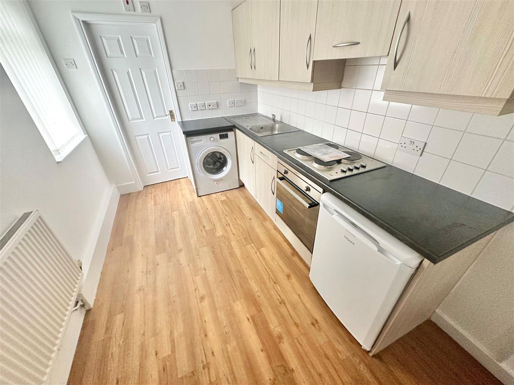Property photo 2 of 5 Kitchen Area