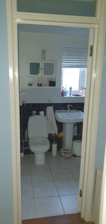 Property photo 2 of 19 Bright, Functional Bathroom With A Pedestal Sink, ...