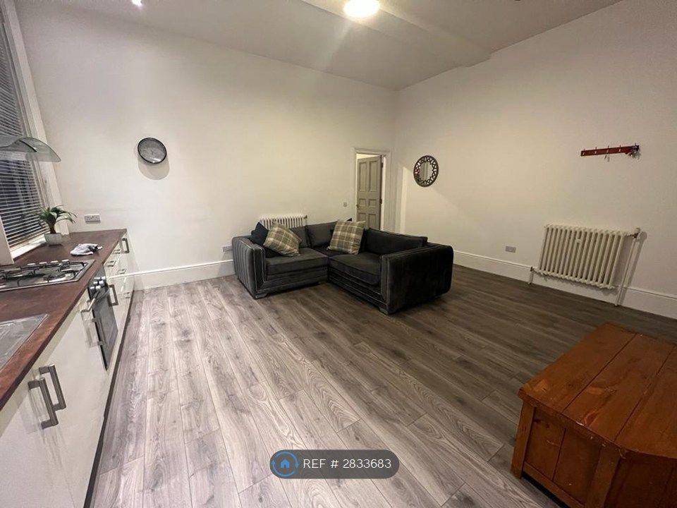 Property photo 3 of 11 Living Area