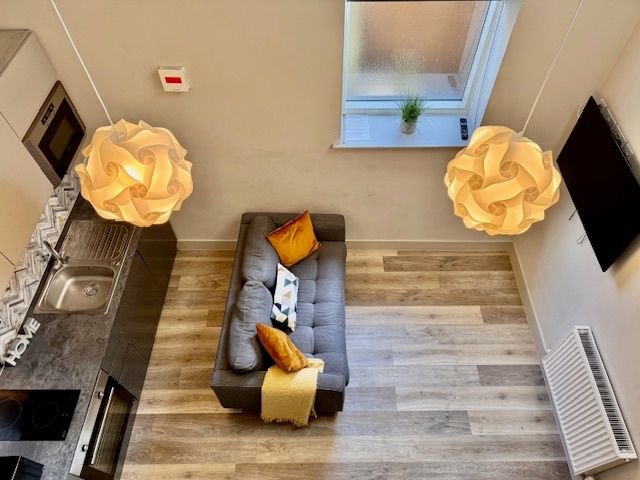 Property photo 3 of 8 Bright, Modern Open-Plan Living Area With Stylish ...