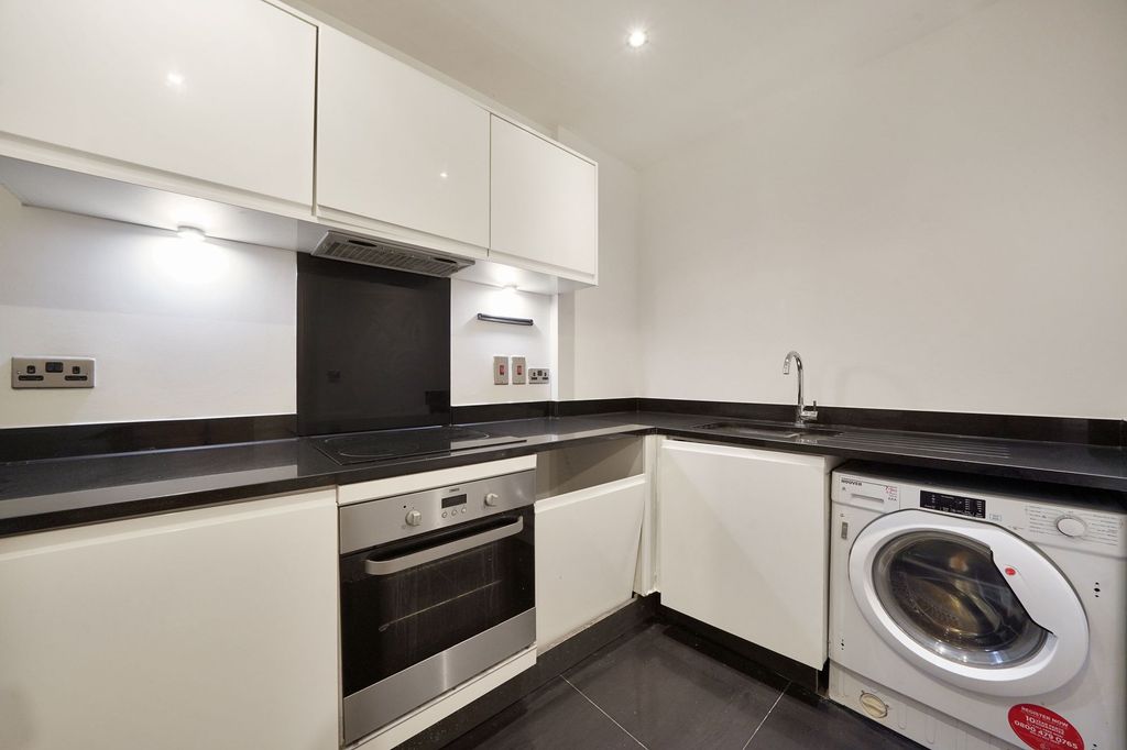 Property photo 2 of 15 Kitchen Area