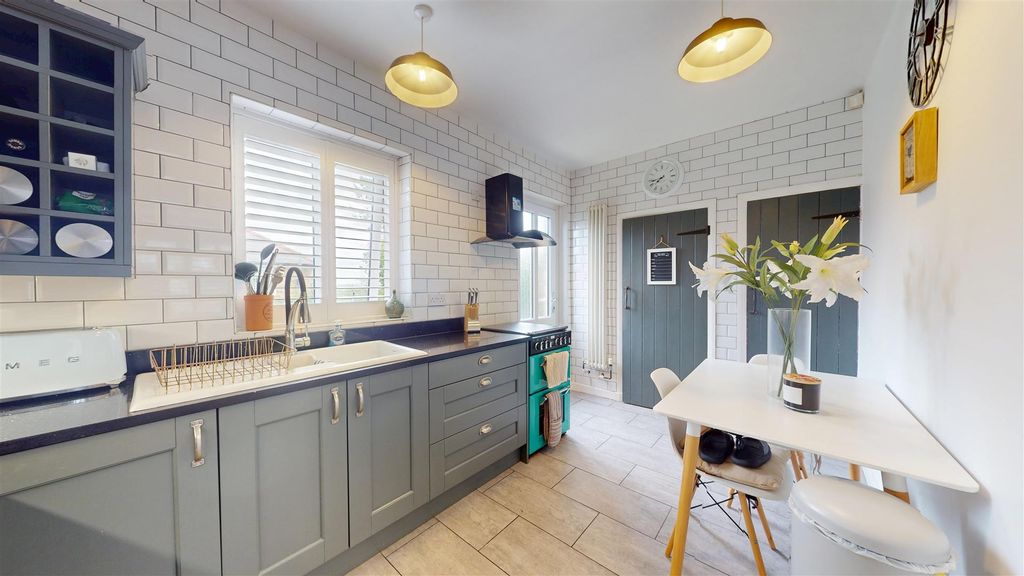 Property photo 2 of 14 Dining Kitchen