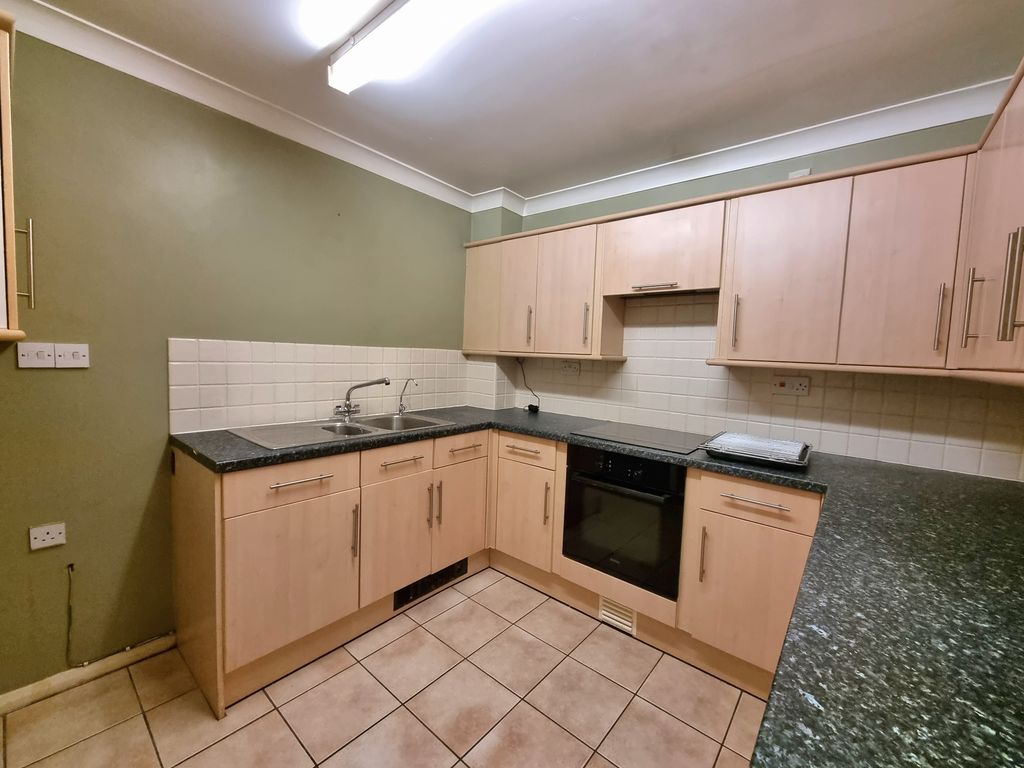 Property photo 3 of 8 Kitchen