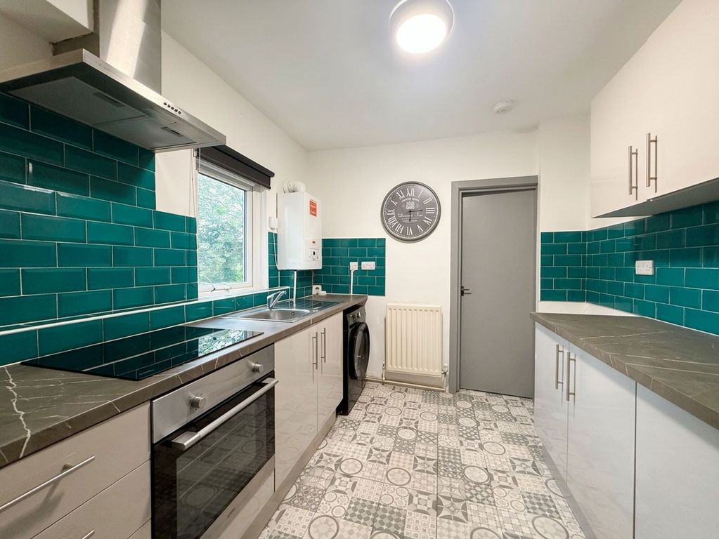 Property photo 2 of 12 Kitchen