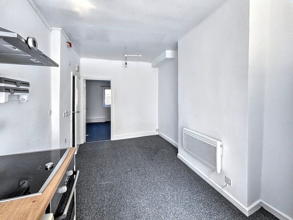 Property photo 3 of 6 Bright, Modern Kitchen Area With Clean White Walls...