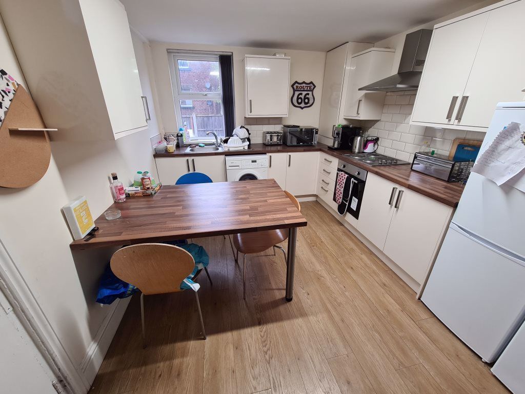 Property photo 1 of 26 Bright And Modern Kitchen Featuring Ample Countert...