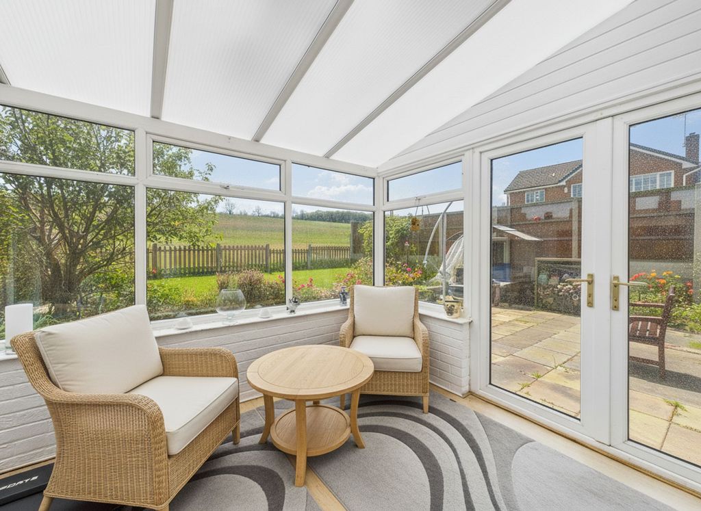 Property photo 3 of 16 Conservatory