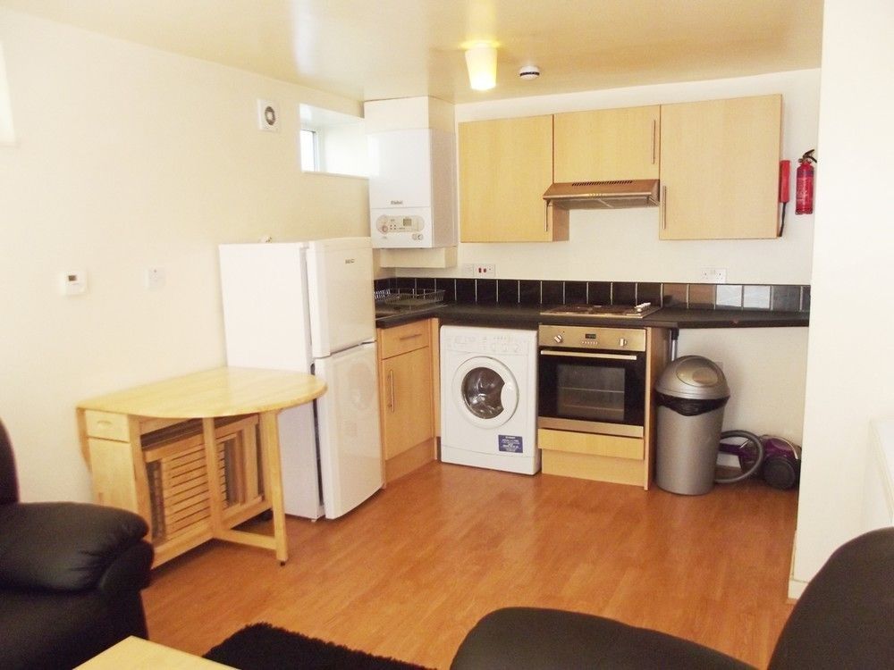 Property photo 2 of 8 Bright Kitchen With Modern Appliances And Dining...