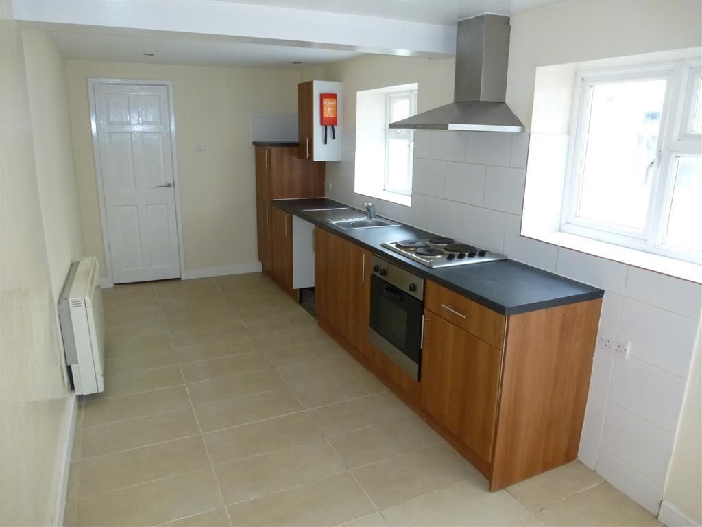 Property photo 1 of 6 Kitchen